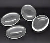 CA702B - 30 pcs. Oval Clear Round Glass Dome Seals Tiles - 25x18mm (1 x 0.71 in) - 25mm x 18mm