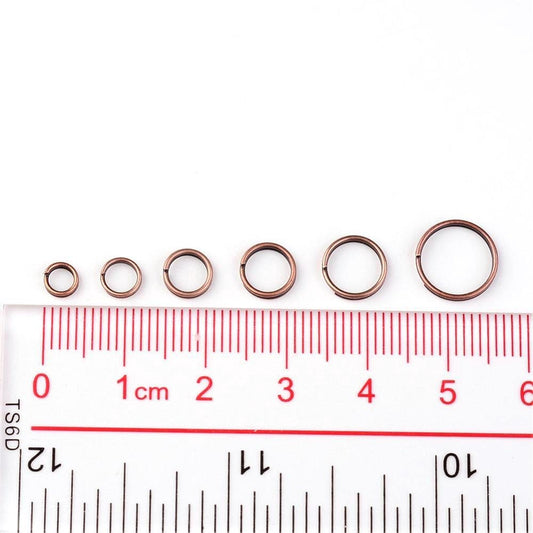 J186 - Assortment Box of Antique Copper Split Jump Rings 4mm, 5mm, 6mm, 7mm, 8mm, 10mm - 1mm-1.3mm Thick - Plastic Storage Box Included