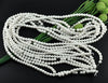 BD153 - 8mm White Glass Pearl Imitation Round Beads - 32 inch strand - Approx. 105 beads per strand