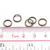 J298 - 100 pcs Antique Bronze Open Jump Rings - 8mm - 21 Gauge (0.7mm Thick)
