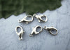 CL053A - 50 pcs. Silver Tone Lobster Clasps - 12mm X 6mm - Made of Alloy - Claw Clasps