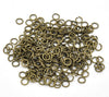 J054 - 100 pcs Antique Bronze Open Jump Rings - 5mm - 20 Gauge