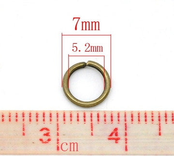 J058 - 100 pcs Antique Bronze Open Jump Rings - 7mm - 18 Gauge