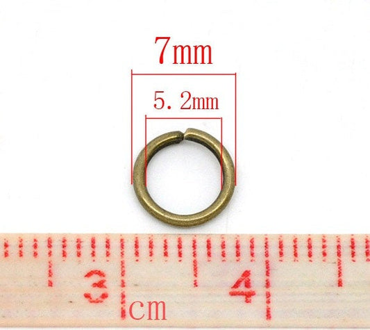 J058 - 100 pcs Antique Bronze Open Jump Rings - 7mm - 18 Gauge