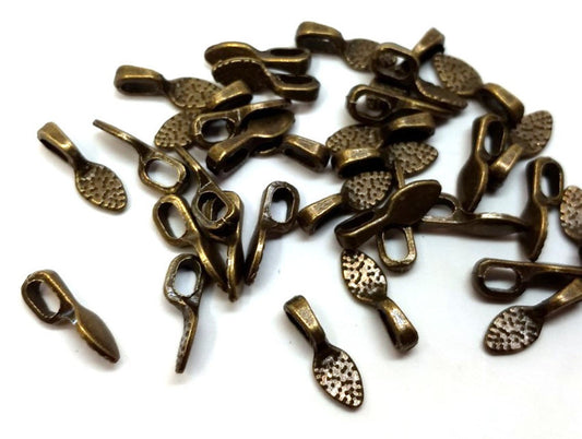 P2228A - 30 pcs. Antique Bronze Small Spoon Tag Glue On Bails - 16mm x 5.5mm - Hole Size: 2.5mm x 4.5mm