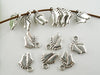 P283 - 100 pcs. Antique Silver Baby Feet Charms Pendants - 12mm x 9mm