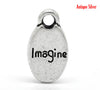P437 - 50pcs. Antique Silver Imagine Charms Pendants - 15mm x 8mm (5/8"x 3/8")