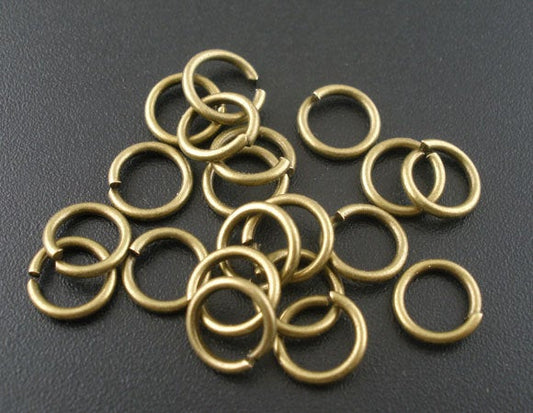 J137A - 100 pcs Antique Bronze Open Jump Rings - 8mm - 16 Gauge (1.2mm Thick)