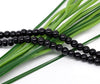 BD125 - 4mm Black Glass Pearl Imitation Round Beads - 32 inch strand