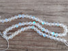 BD955 - 6mm Clear Iridescent Aurora Frosted Glass Round Beads - 14" strand (36cm) - Approx 60 beads per strand - Hole Size: 0.8mm