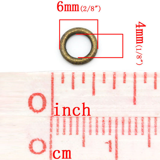 J105 - 100 pcs Antique Bronze Soldered Closed Jump Rings - 6mm - 18 Gauge (1mm Thick)