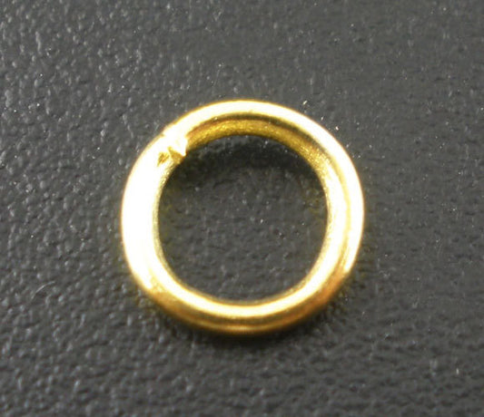 J179 - Box with Assortment of 1780pcs Gold Plated Open Jump Rings- 3mm to 9mm