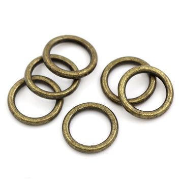 J110 - 100 pcs Antique Bronze Soldered Closed Jump Rings - 8mm - 17 Gauge (1.4mm Thick)