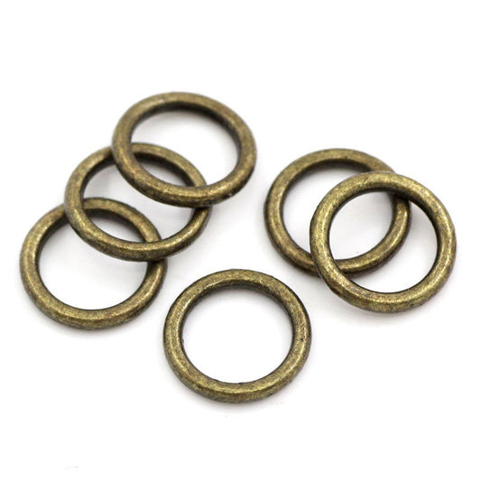 J110 - 100 pcs Antique Bronze Soldered Closed Jump Rings - 8mm - 17 Gauge (1.4mm Thick)