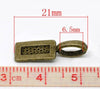 BA052 - 100 pcs. Antique Bronze Medium Glue On Bails - 21x7mm