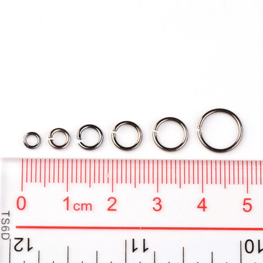J314 - 1600 pcs. Assortment Box of Gunmetal Open Jump Rings 4mm, 5mm, 6mm, 7mm, 8mm, 10mm - 1mm-1.3mm Thick - Plastic Storage Box Included